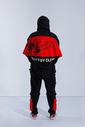 Back of model wearing 2 Wayz Hoodie. Large red zipper is undone across the back, showing inside - A red panel with Astro Boy falling