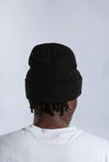 Back of model wearing black Astro Boy beanie 