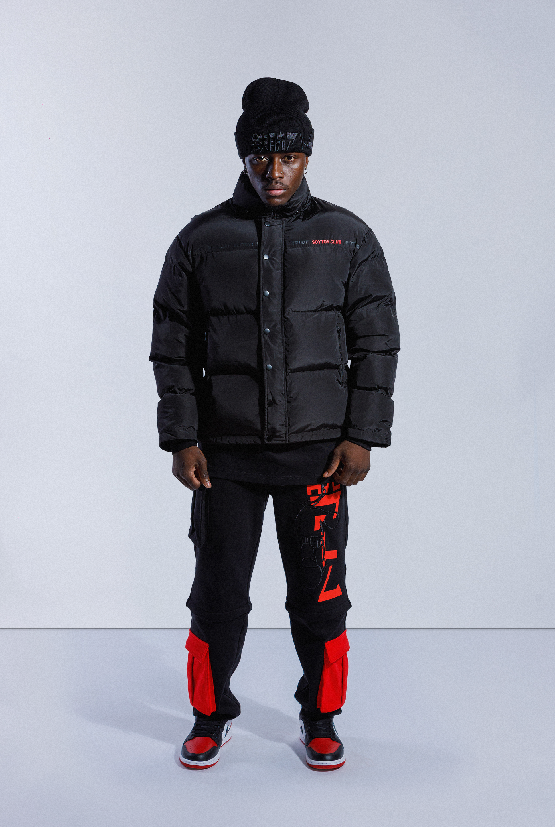 Model wearing black Astro Boy puffer