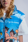 Close up of Astro Boy Family Portrait vest showing white Katakana screen print reading 'SOYTOY CLUB' on left chest