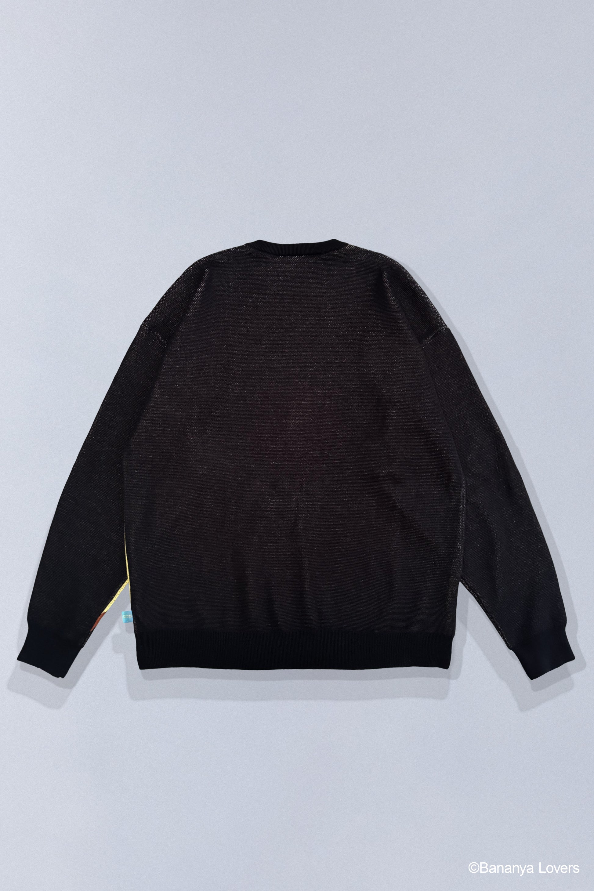 Back of black knit Bananyako sweater. 