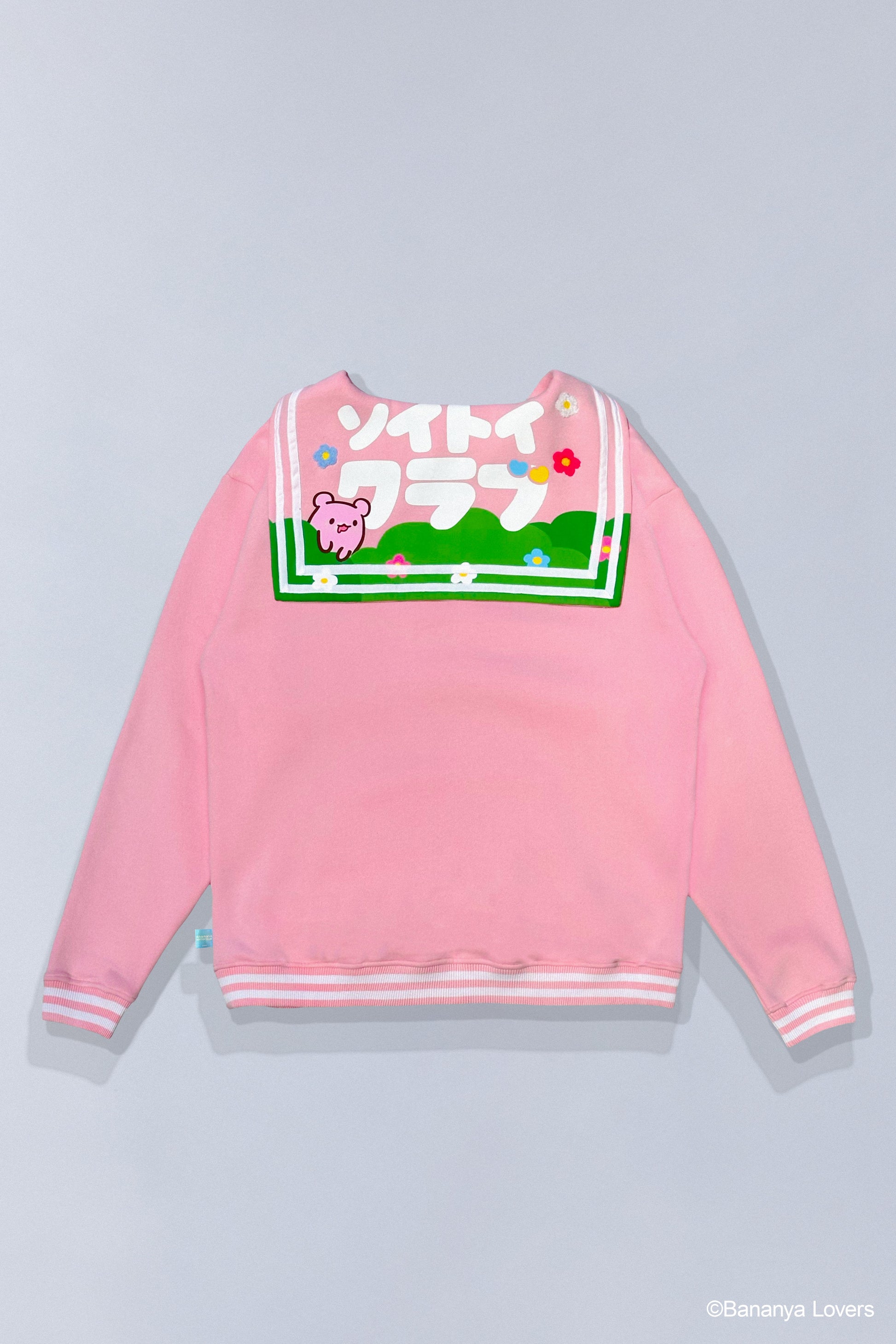 Back view of Bananya SOYTOY CLUB Seifuku sailor-style sweater. Sailor flap has Bananya scene on it.