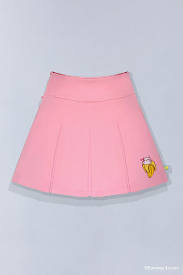 Pink pleated Bananya skirt with a small Bananya embroidered on bottom left