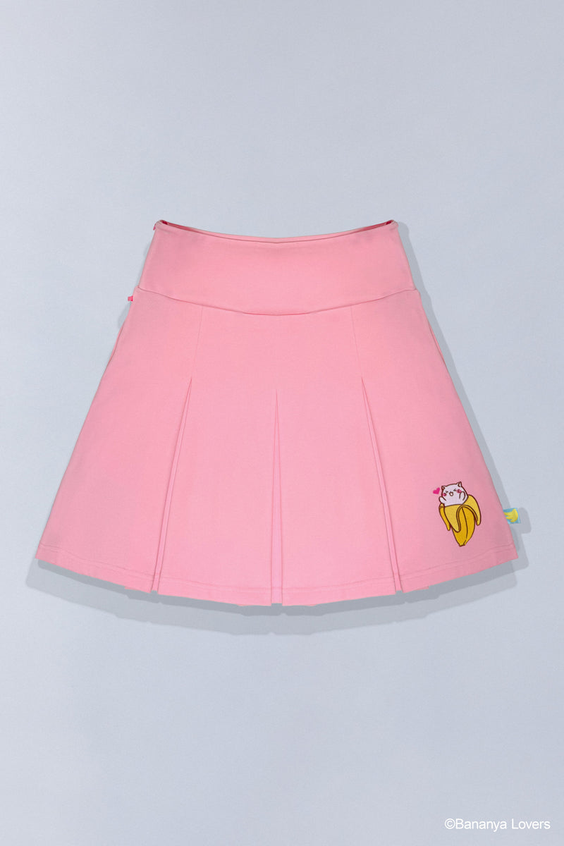 Pink pleated Bananya skirt with a small Bananya embroidered on bottom left
