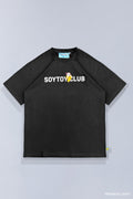 Front of black Bananya Logo t-shirt. Shows white 'SOYTOY CLUB' text with embroidered Bananya cat on top.